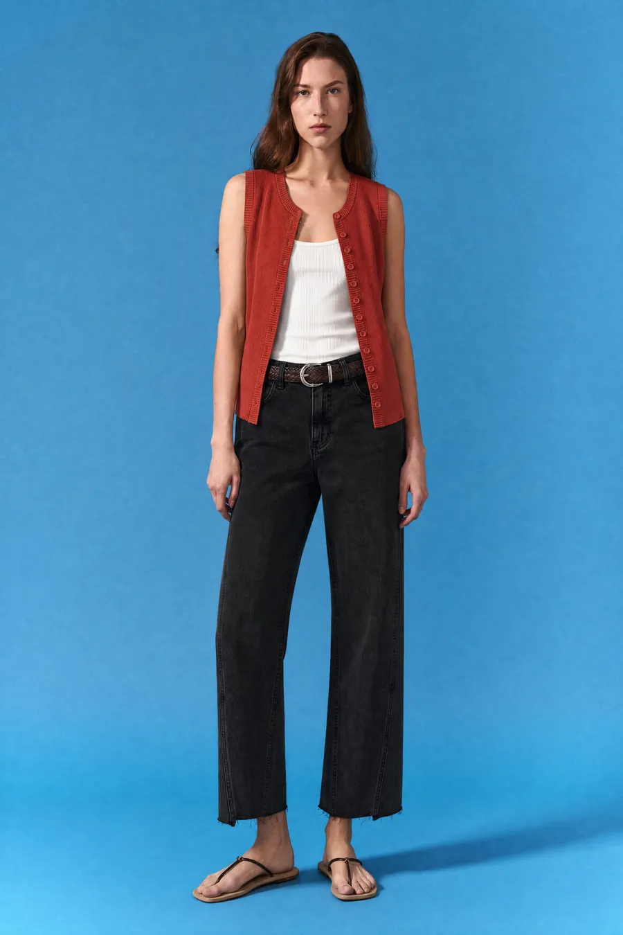 Delucca Spring Collection: on-model look 4 on a blue studio backdrop