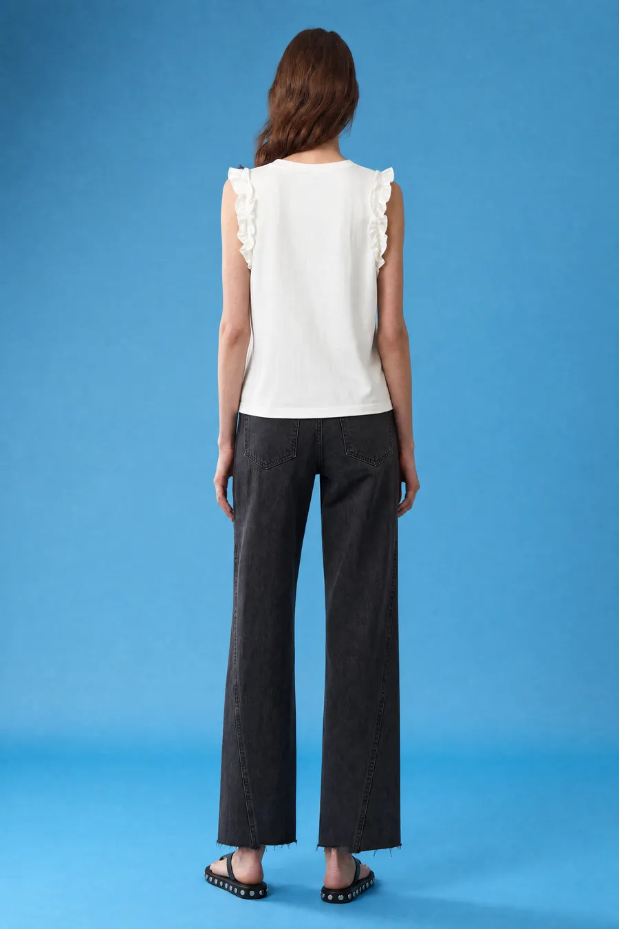 Taliya result 2 for Delucca: on-model shot on a blue backdrop